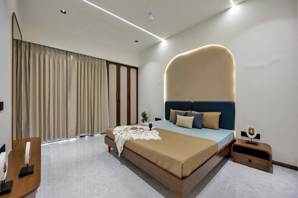 Shubham Sky sample flat bedroom with arched headboard